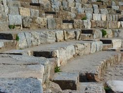 ancient stone benches in ruins of theater, turkey, ephesus