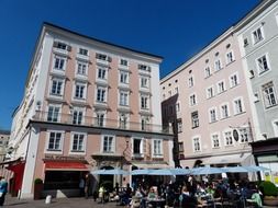 cafe at townhouses on old marketplace, austria, salzburg