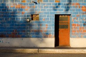 grunge brick wall with door, mexico