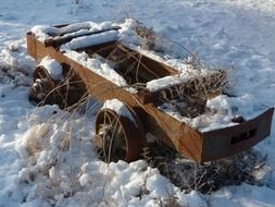 old rusty mining lore on snow, canada, british columbia
