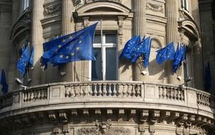 european union flags on balcony, france, paris