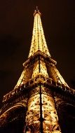 low angle view of illuminated eiffel tower at dark sky, france, paris