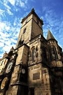 low angle view of tower with astronomical clock, czech, prague