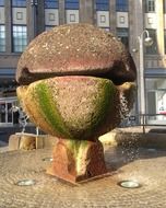 stone sphere, water fountain in city