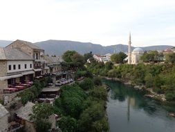 landscape of mosque in old town at river, bosnia and herzegovina, mostar