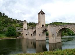 Pont ValentrÃ©, aged fortified stone arch bridge with towers in countryside, france, cahors