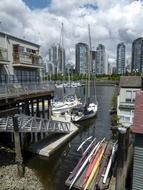 anchored sailing boats in view of city, canada, vancouver, false creek harbor