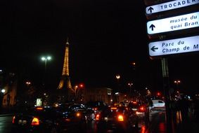 street signs in night paris