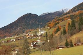 village on mountain side, scenic autumn landscape, austria, groÃkirchheim