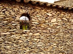 stone house with a window