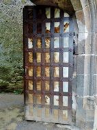 old rusty gate in a castle in Murolles, France