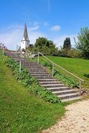 stairs on a green hill