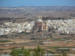 distant view of the dome church in mgarr in Malta