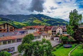 building near alpine mountains