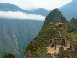 Machu Pikchu is a 15th-century Inca citadel situated on a mountain ridge