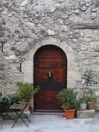 old wooden door with door knocker, france, provence