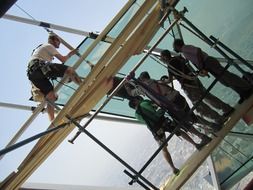mounting glass on a building in saudi arabia