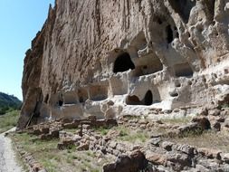 cliff dwelling in the bandelier national monument, usa, new mexico