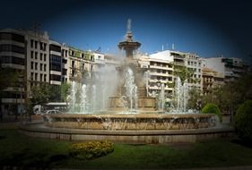 beautiful fountain in the square in Granada, Spain