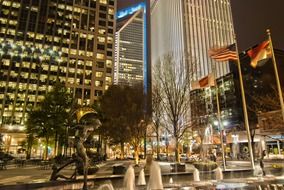 flags on square in uptown at night, usa, North Carolina, charlotte