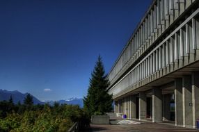 landscape of simon fraser university building and forest