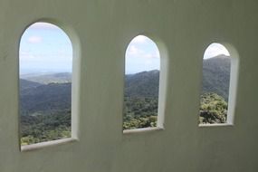 view of the hills from arched windows
