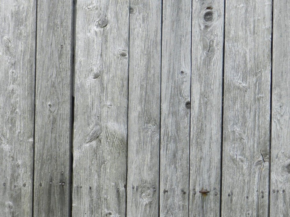 wall of old weathered wooden barn, background