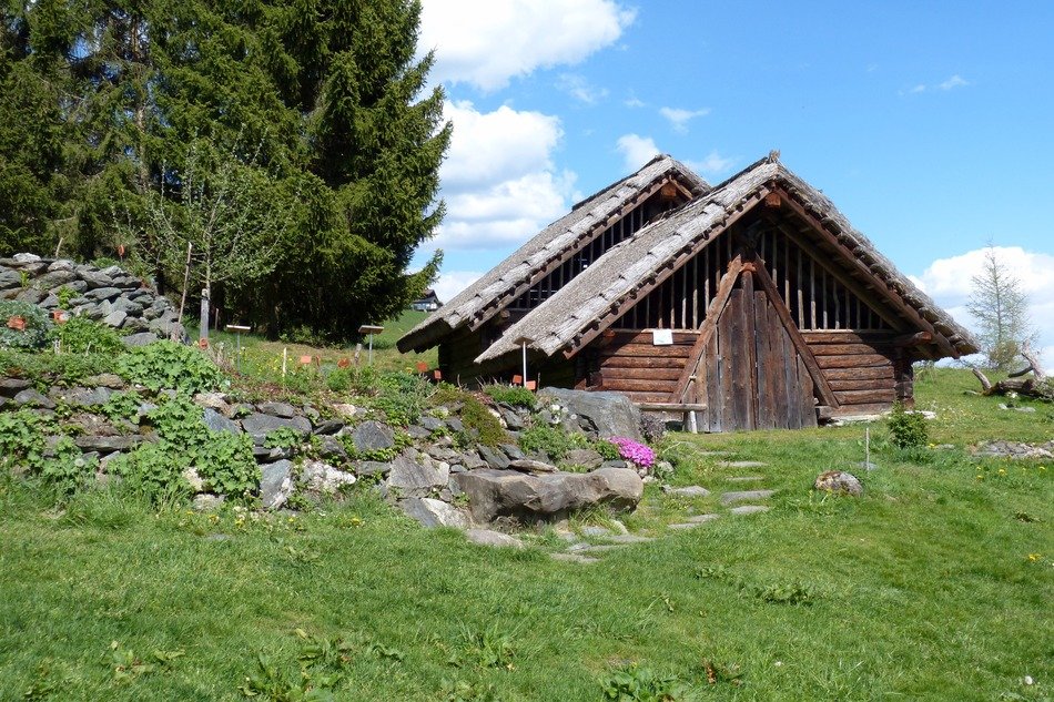 celts village buildings at summer, reconstruction, austria
