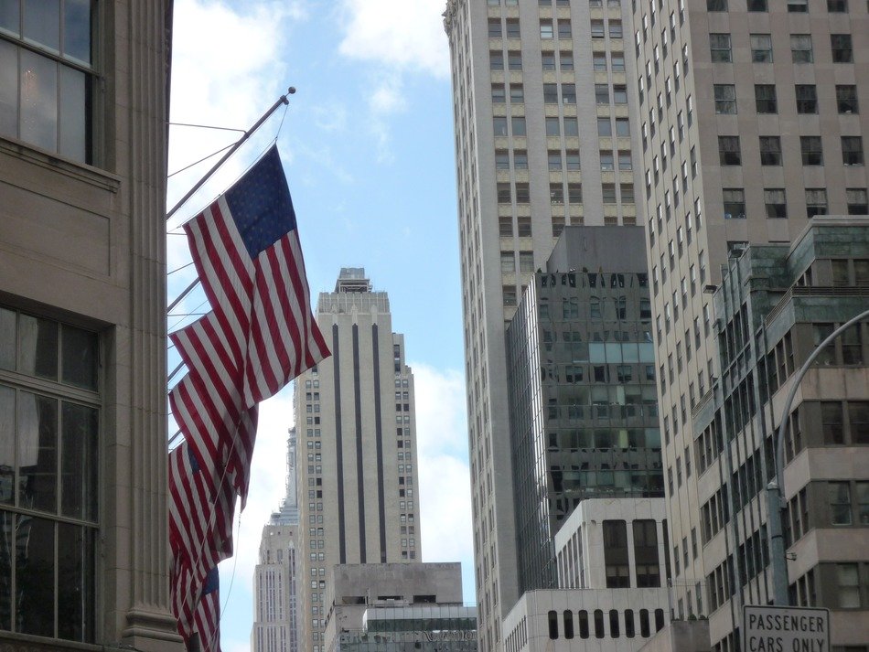 cityscape view of the buildings with the flags, New York
