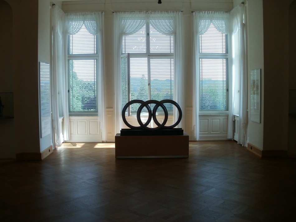 abstract sculpture at window in room