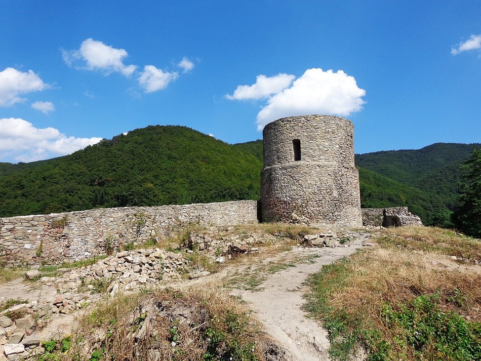 medieval tower and wall at green mountains, poland, Rytro