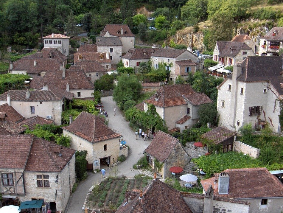 old houses with clay tile roofs in village