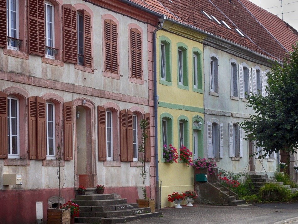 old colorful buildings side by side, france, alsace