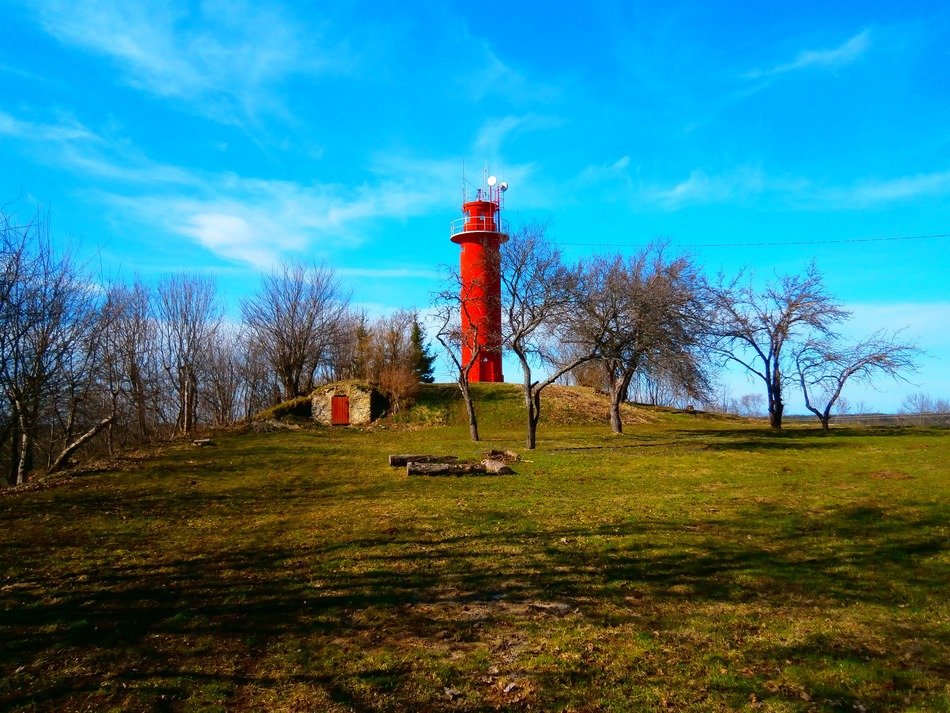 red Viimsi lighthouse on hill at spring, Estonia