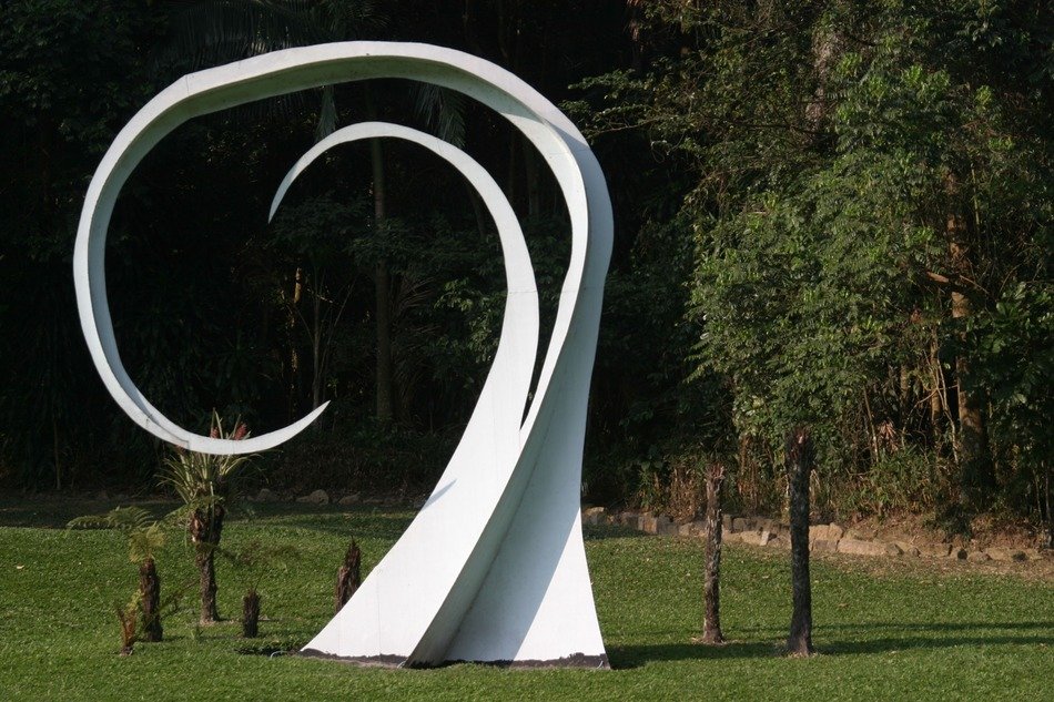 white swirl, abstract modern sculpture in park, brazil