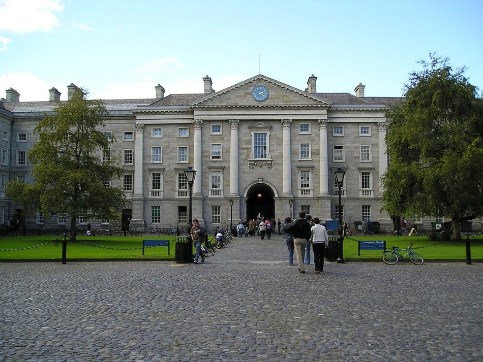 students at gate of trinity college, uk, ireland, dublin