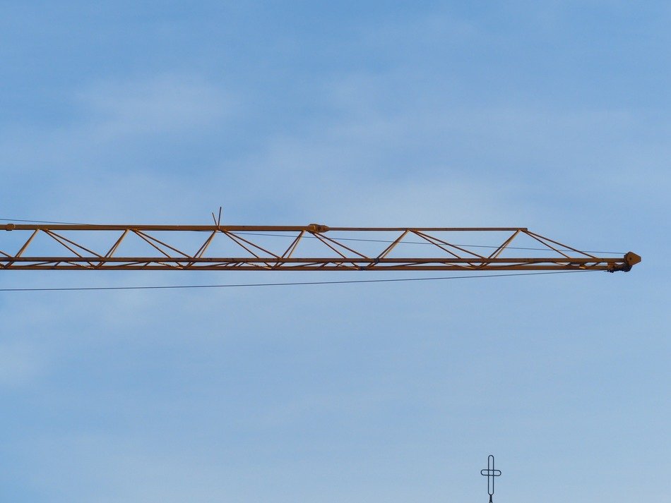 part of crane arm at sky