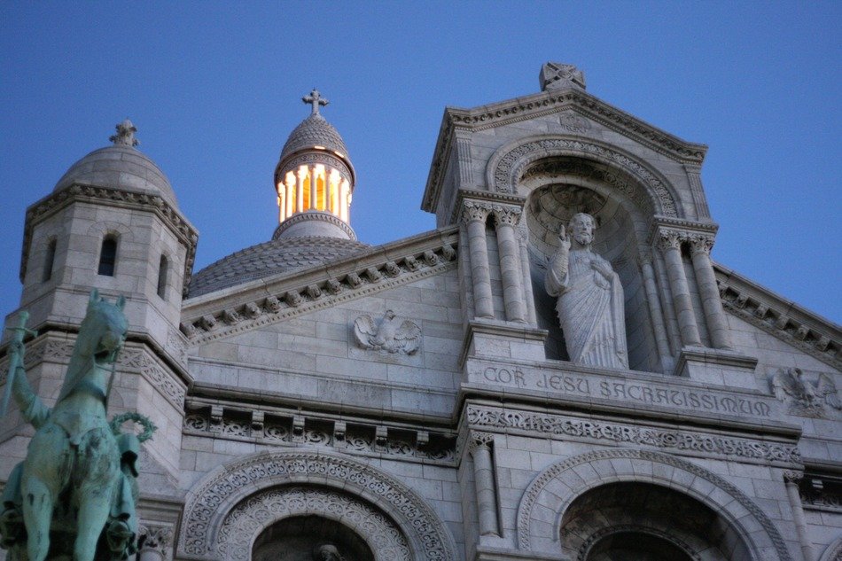 top of Sacré-Cœur Basilica facade at evening sky, france, paris