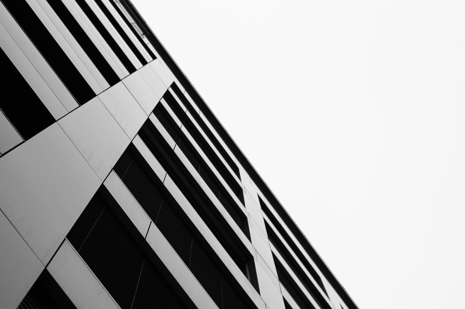 diagonal view of high rise building, black and white