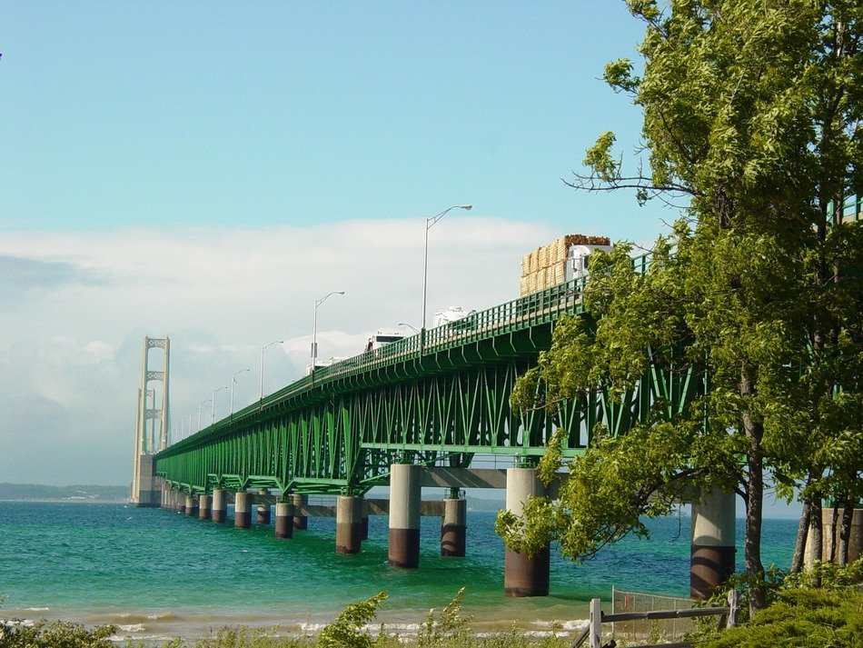 low angle view of mighty mac, Mackinac Bridge across michigan lake at summer, usa