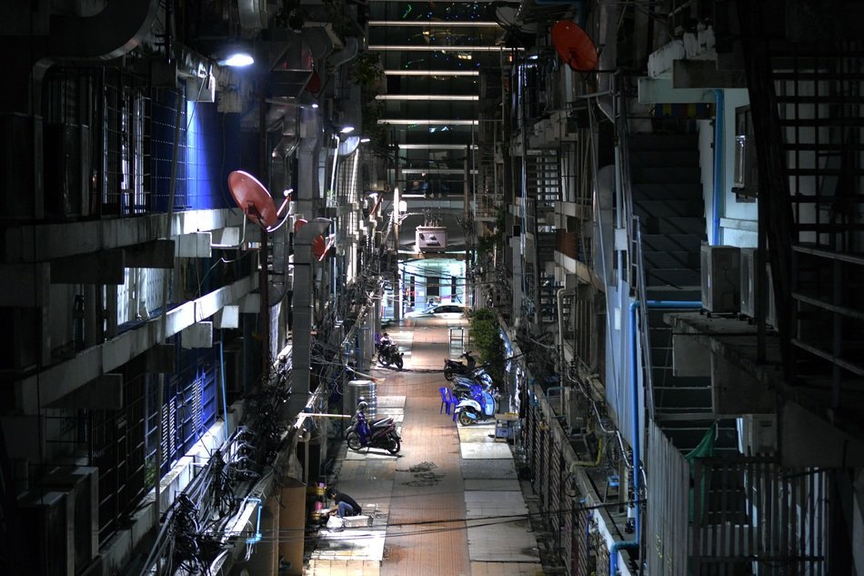 scary alley in asian city at night