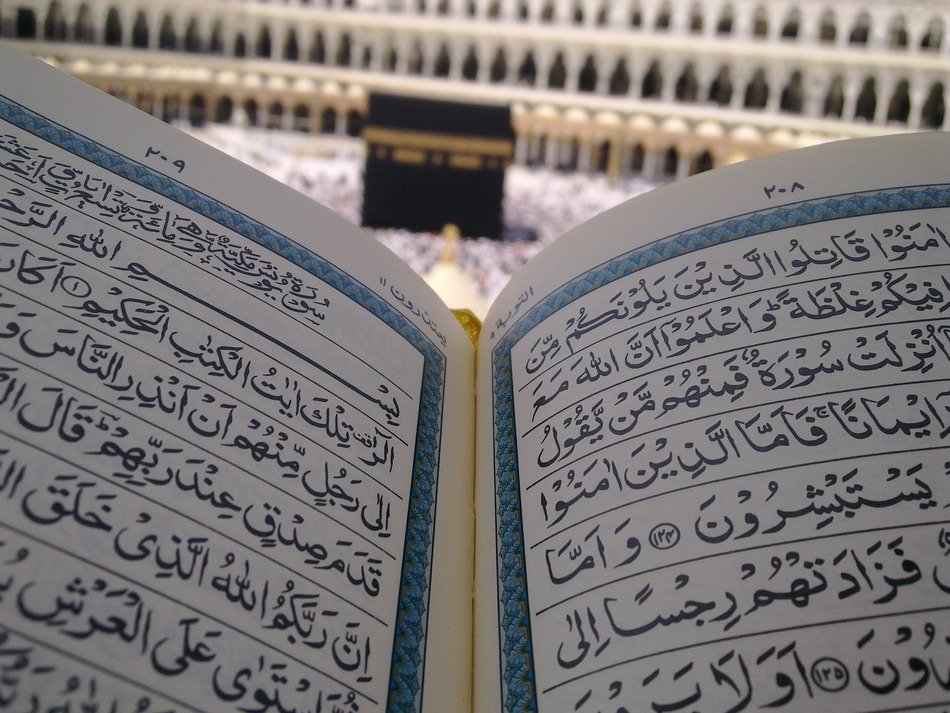 open quran at kaaba, house of allah, Saudi Arabia, Mecca