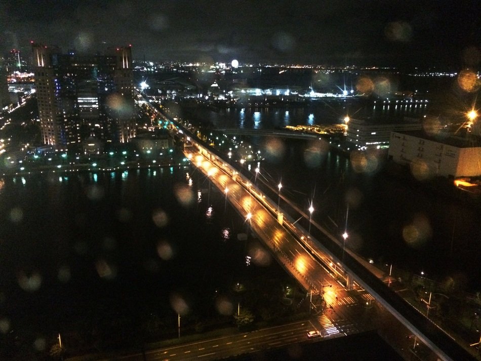 top view of night city in rainy season, japan, tokyo