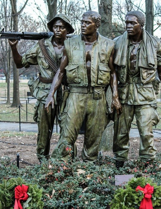 bronze sculptures of three soldiers in Vietnam Veterans Memorial, usa, washington dc