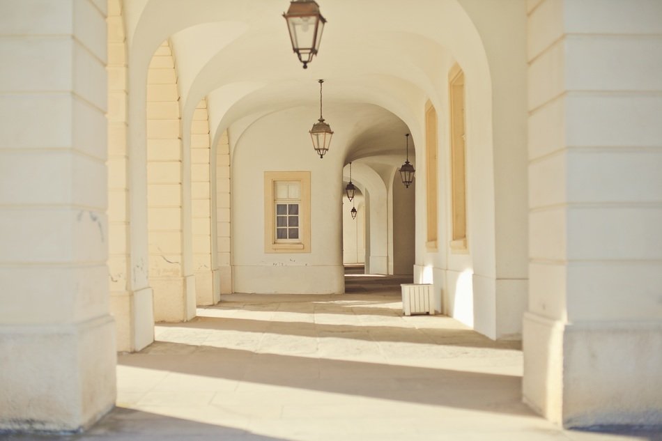 Shadows of white columns on the ground