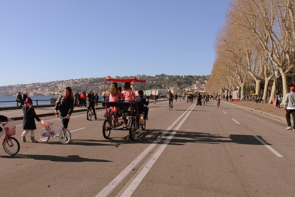 strollers on the seafront of Naples