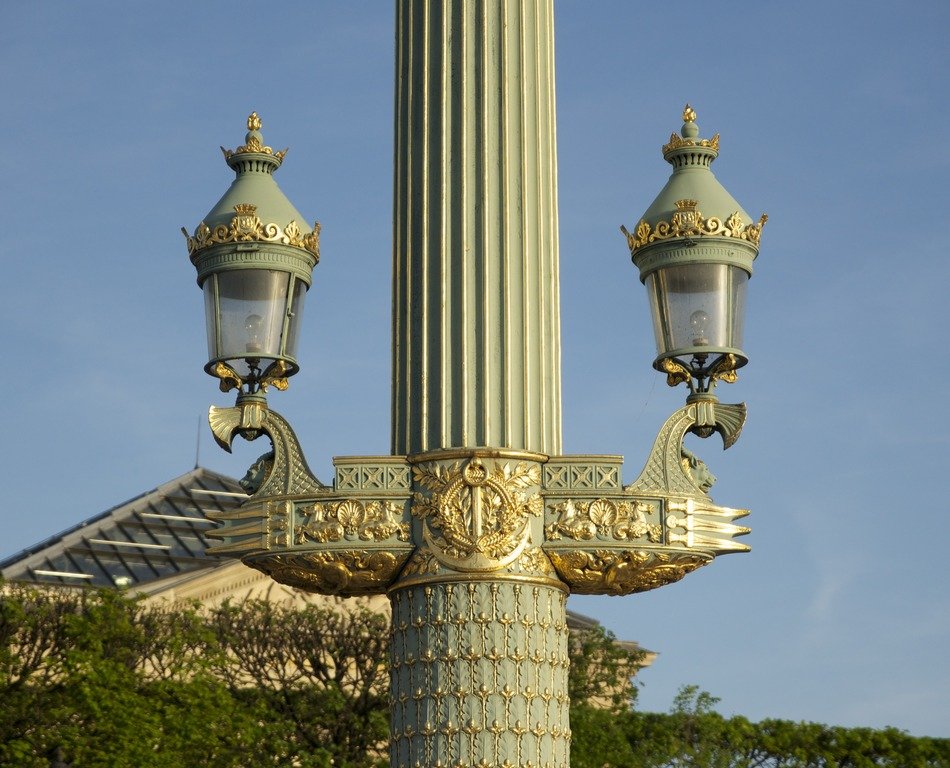 street lanterns on ornate column, france, paris