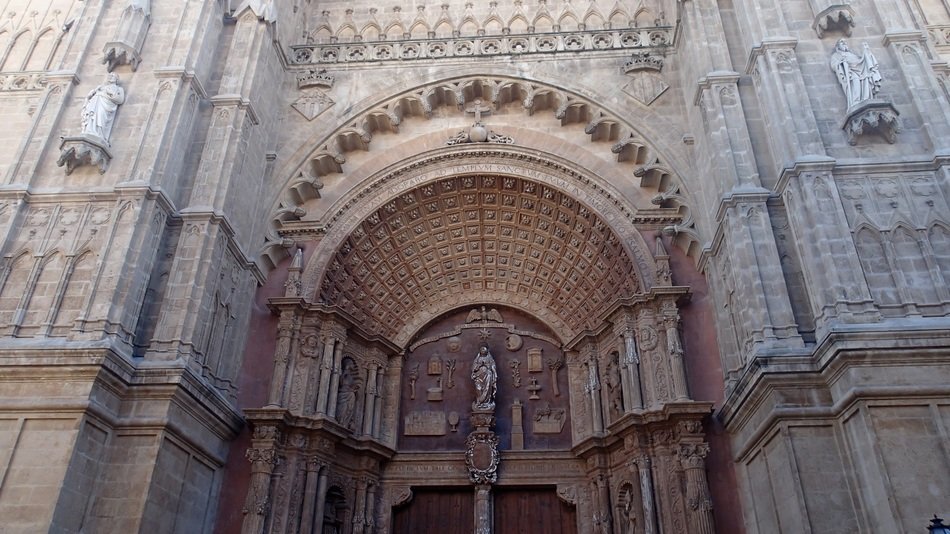 beautiful stone carving on facade at entrance to cathedral of santa maria, spain, majorca