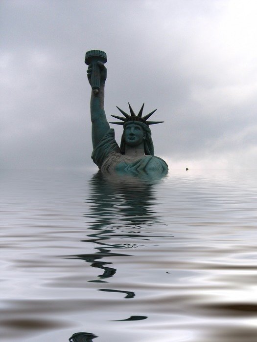 flooded statue of liberty at cloudy sky, collage