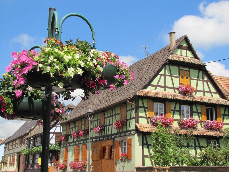 beautiful flower decorations on street and facades, france, ban-rhin